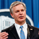 FBI Director Christopher Wray speaks at a news conference at the Justice Department in Washington, Monday, Nov. 8, 2021.